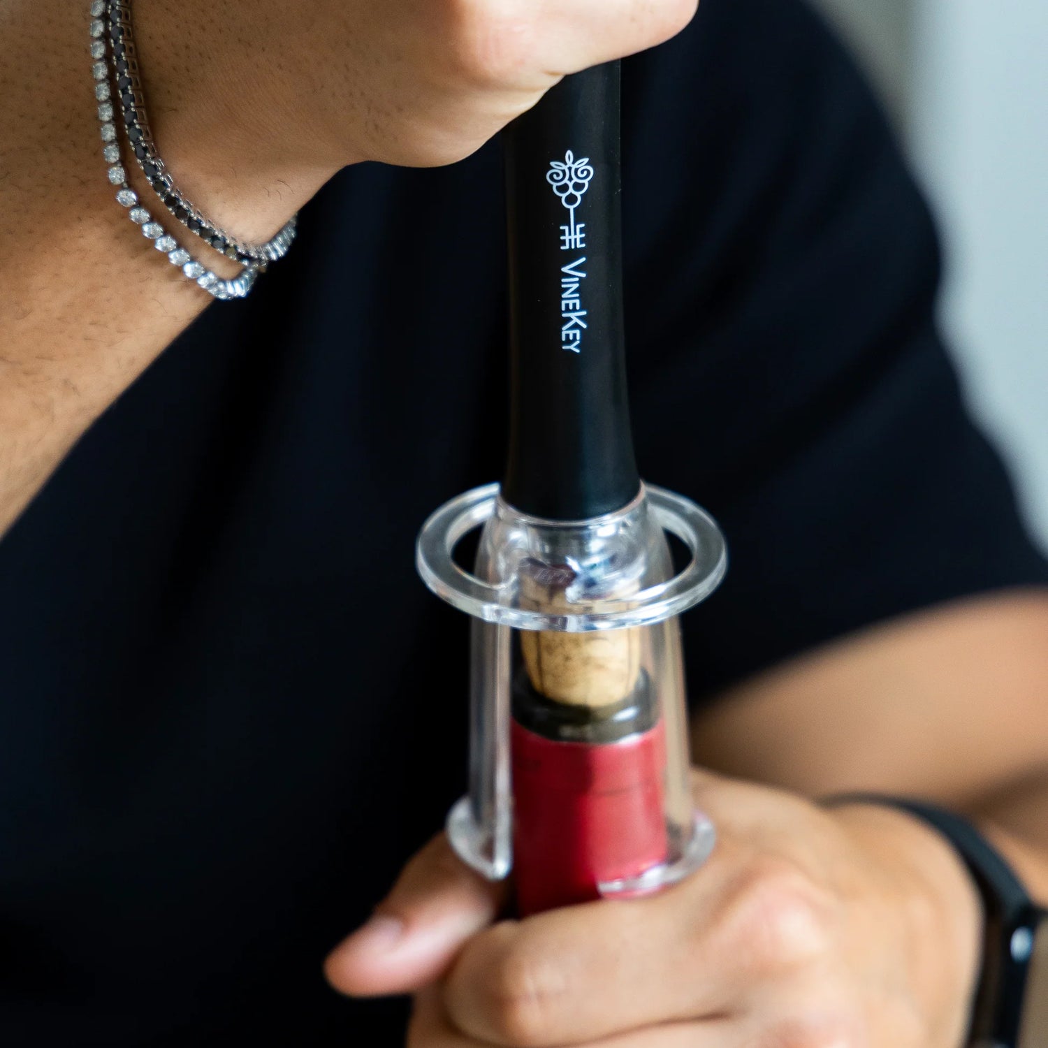 VineKey full set in use — opener, wine, and accessories on the table during serving